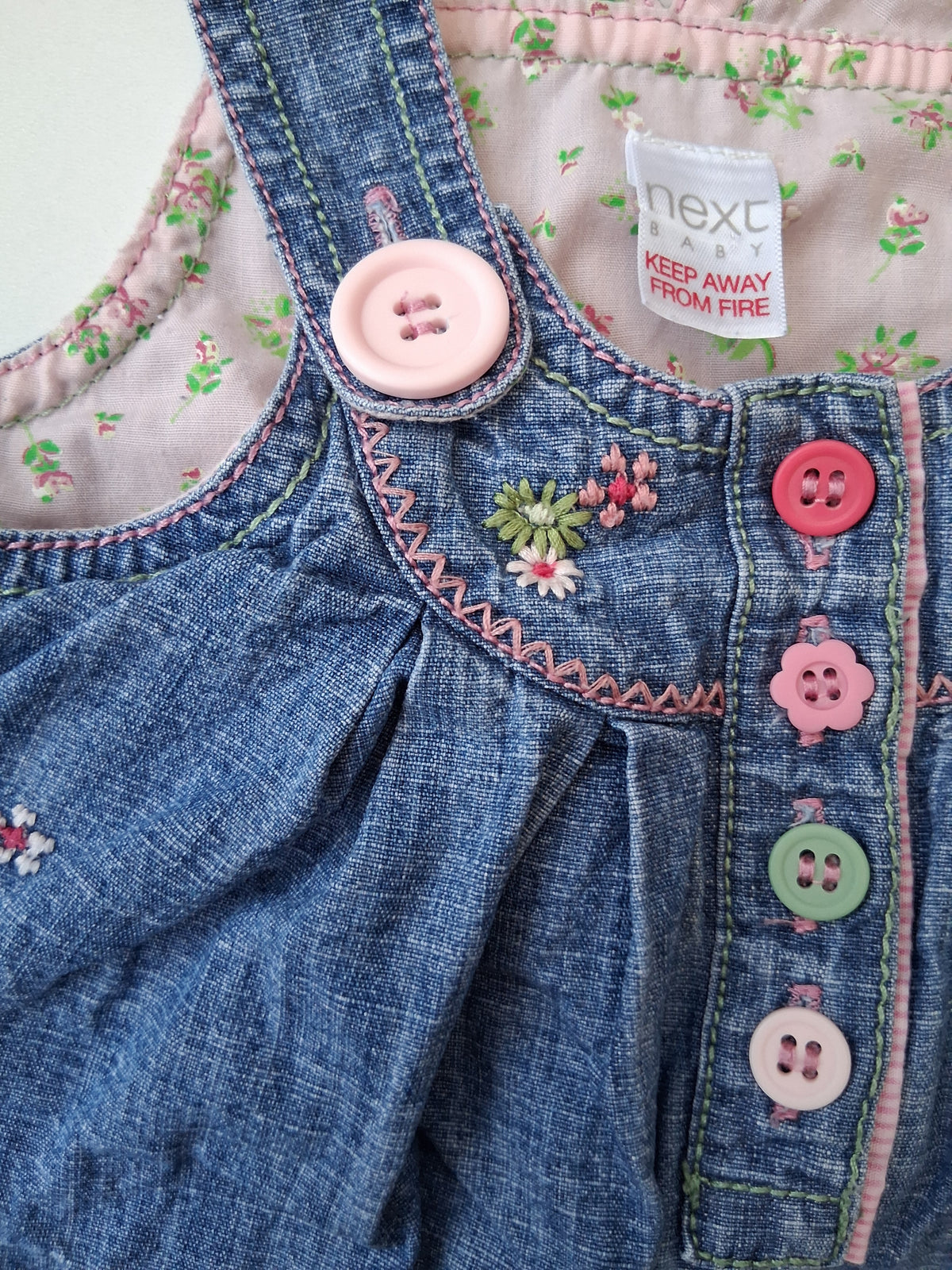 Next - Denim dress with floral embroidery - 6-9 Months